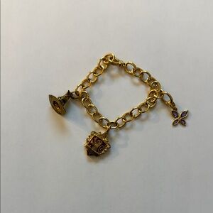 Harry Potter Elegant Gold Charm Bracelet with Purple Accents